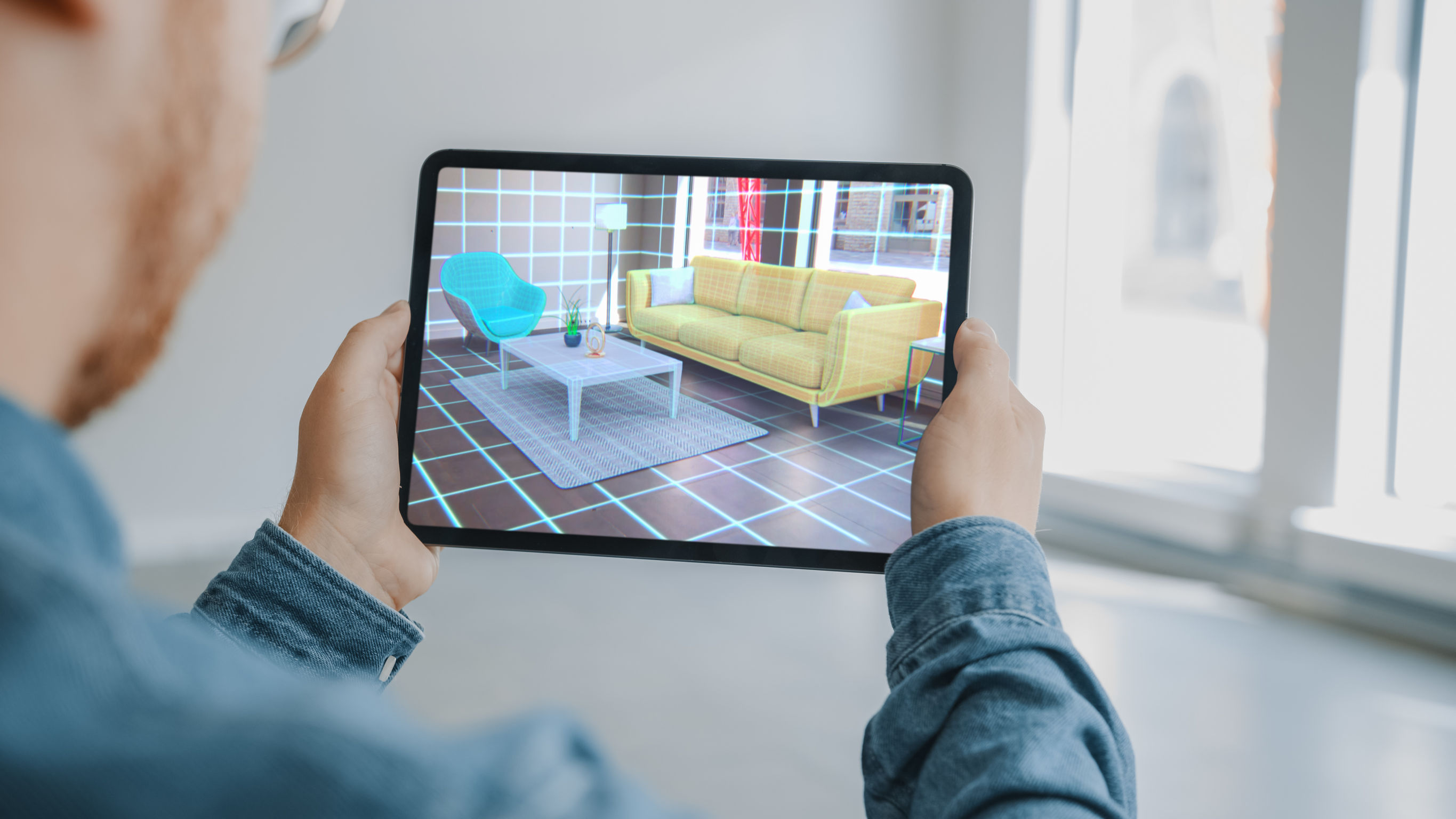Virtual objects such as furniture can be placed in a real room via AR.  Photo: © Alexei Gorodenkov/123RF.com